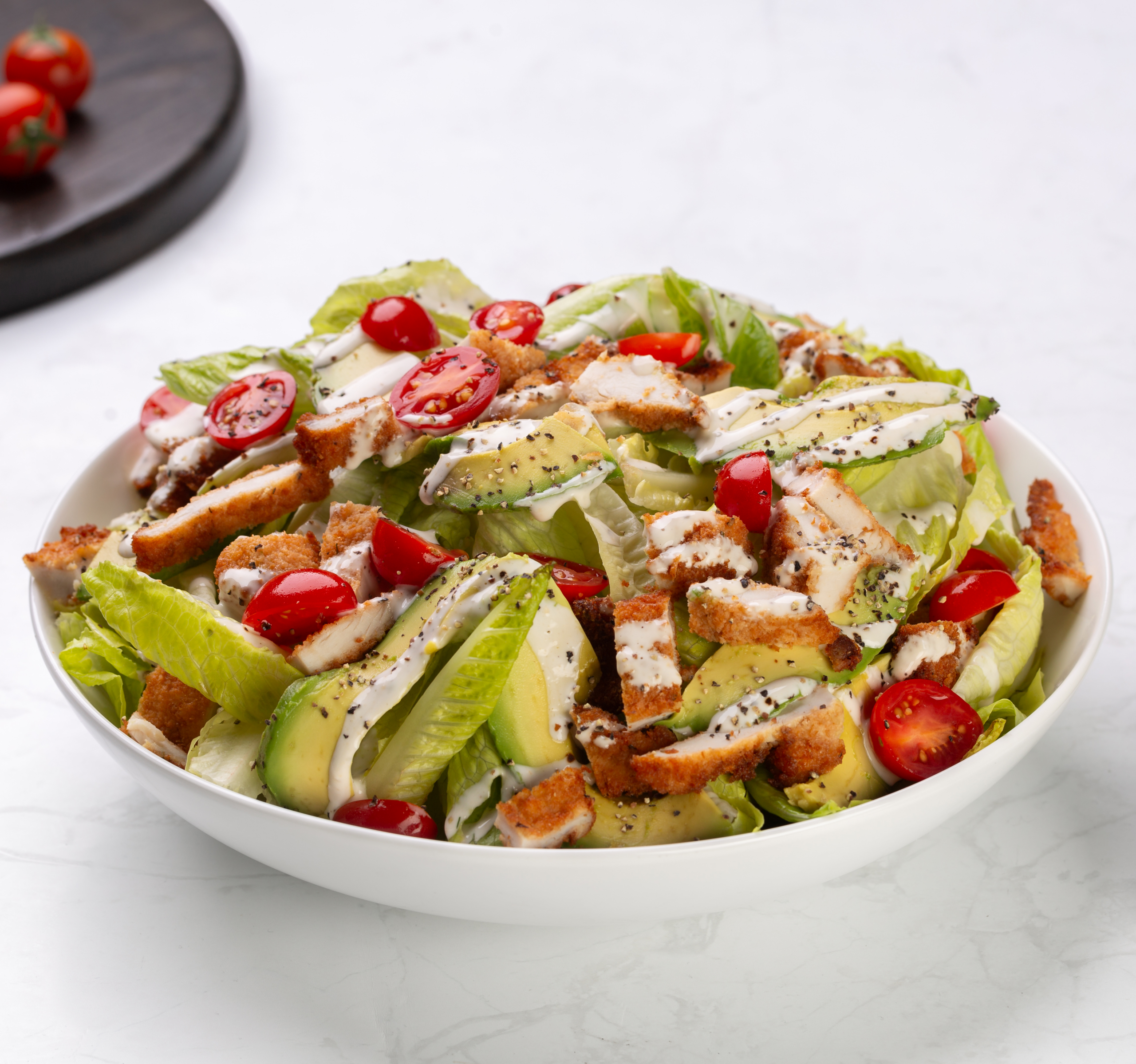 Free Range Chicken Cutlet, Caesar & Avo Salad
